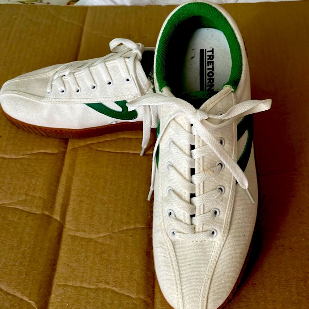 Tretorn canvas sneakers with emerald green trademark. Worn once. Size nine.